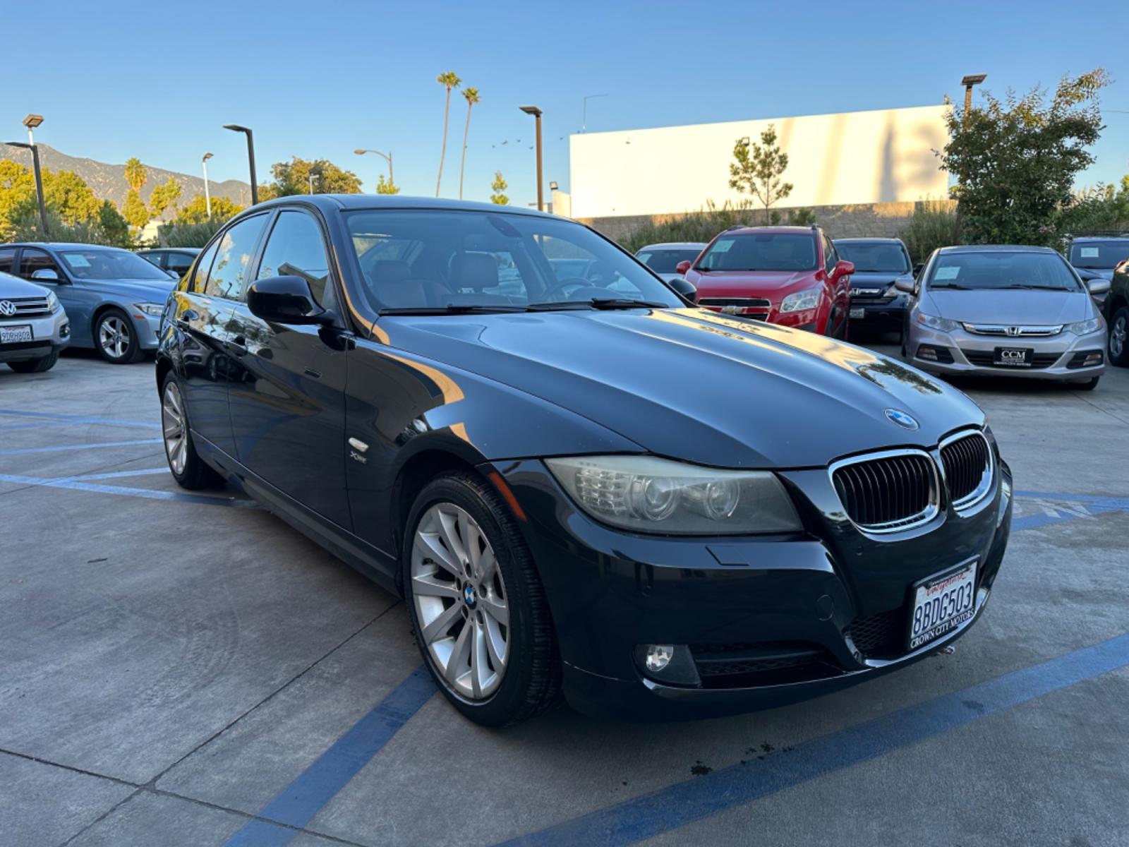 2011 /Tan BMW 3-Series 328i xDrive (WBAPK7C58BF) with an 3.0L L6 DOHC 24V engine, Automatic transmission, located at 30 S. Berkeley Avenue, Pasadena, CA, 91107, (626) 248-7567, 34.145447, -118.109398 - X Drive! South African Edition! Moon-roof! Leather! 2011 BMW 3-Series 328i xDrive - Luxury Meets Practicality in Pasadena, CA Dive into a realm where luxury and performance synchronize seamlessly. The 2011 BMW 3-Series 328i xDrive is not just a car; it's an experience. This model boasts BMW's - Photo #6